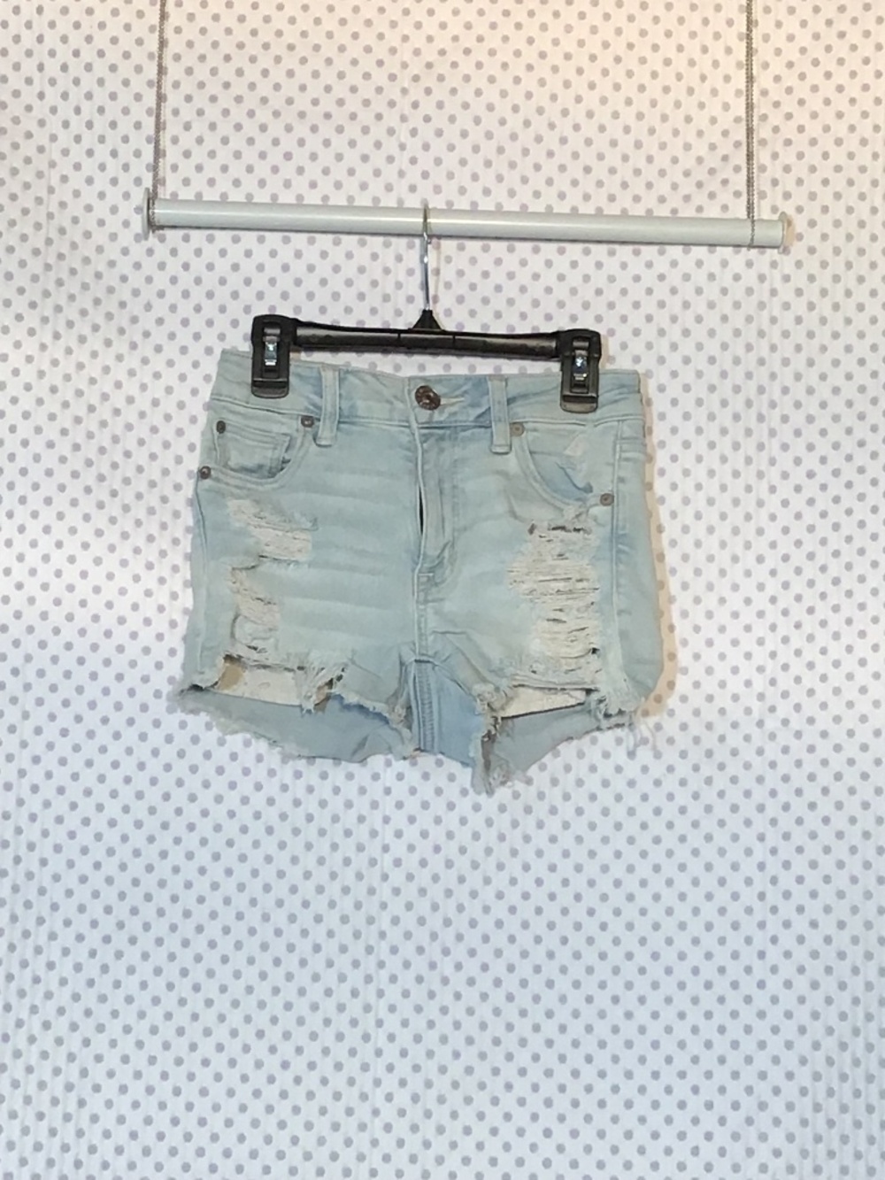 American Eagle Outfitters light-wash distressed denim shorts